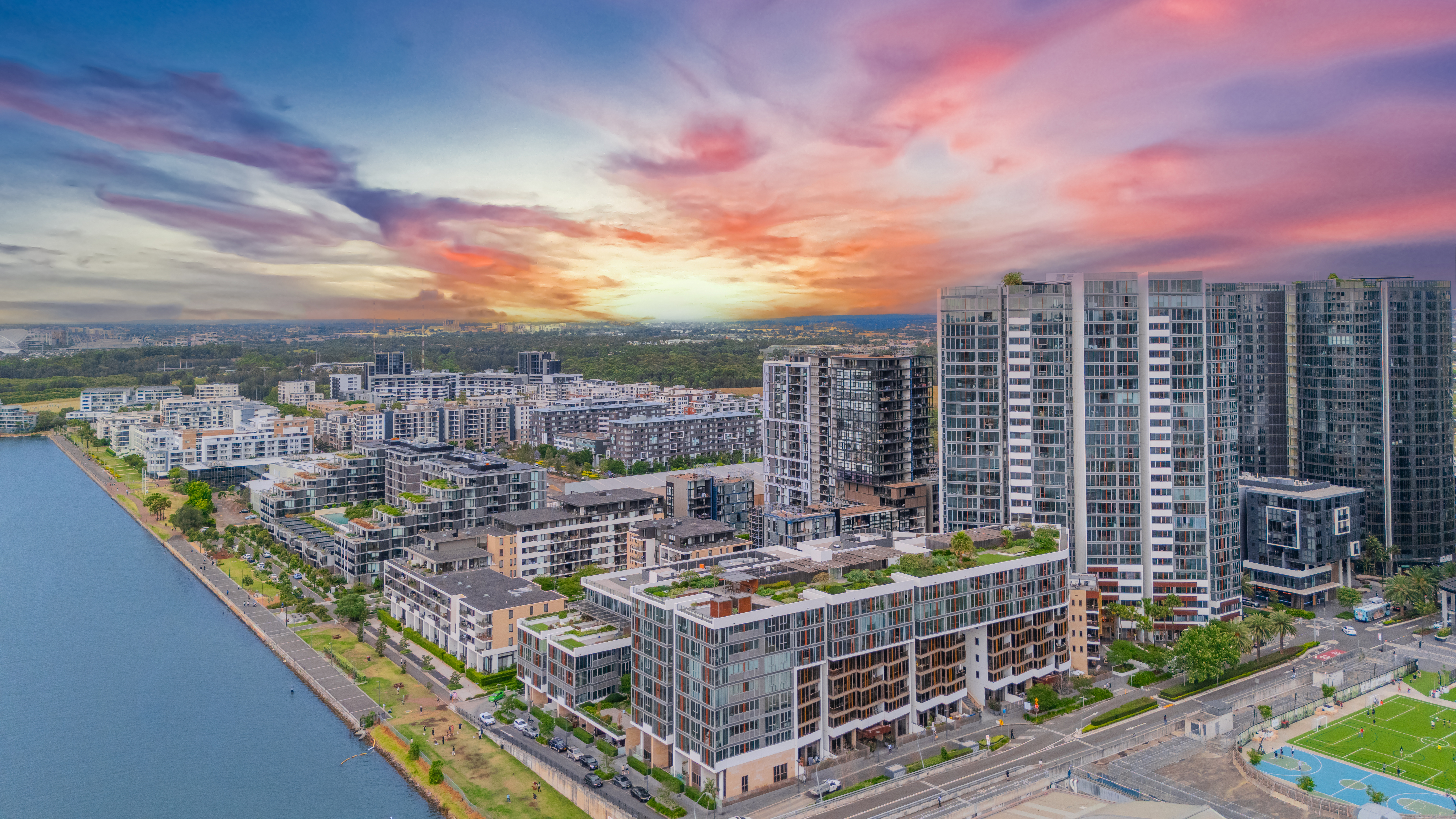 [Newly built residential high-rise apartments on Parramatta River in Wentworth Point]