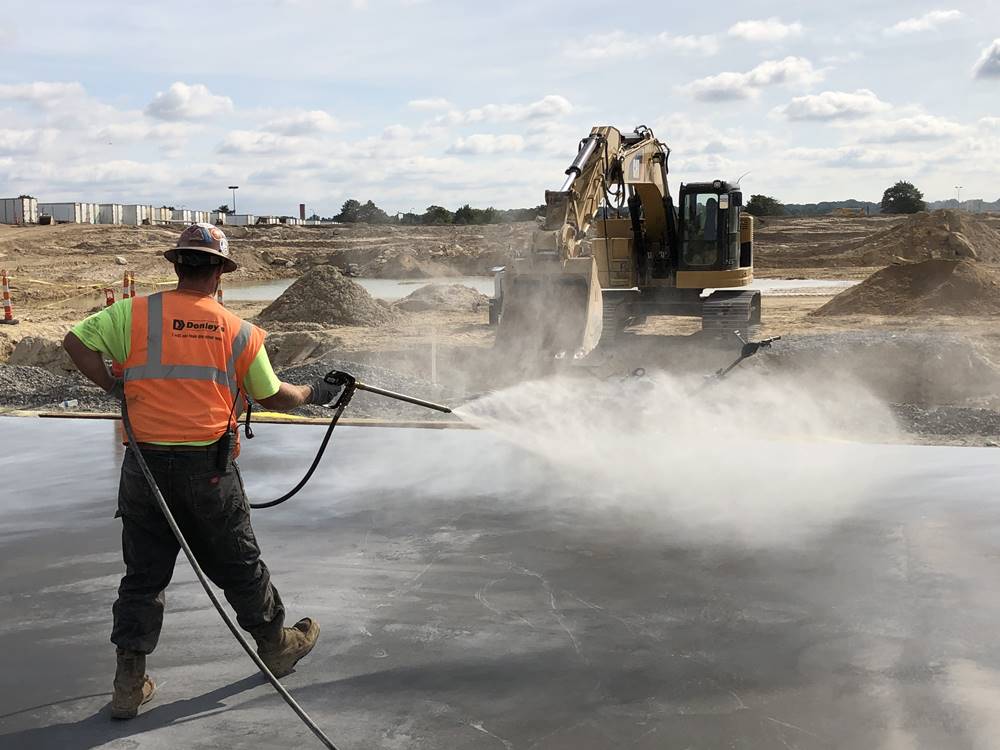 Evencure AC being spray applied to substrate.